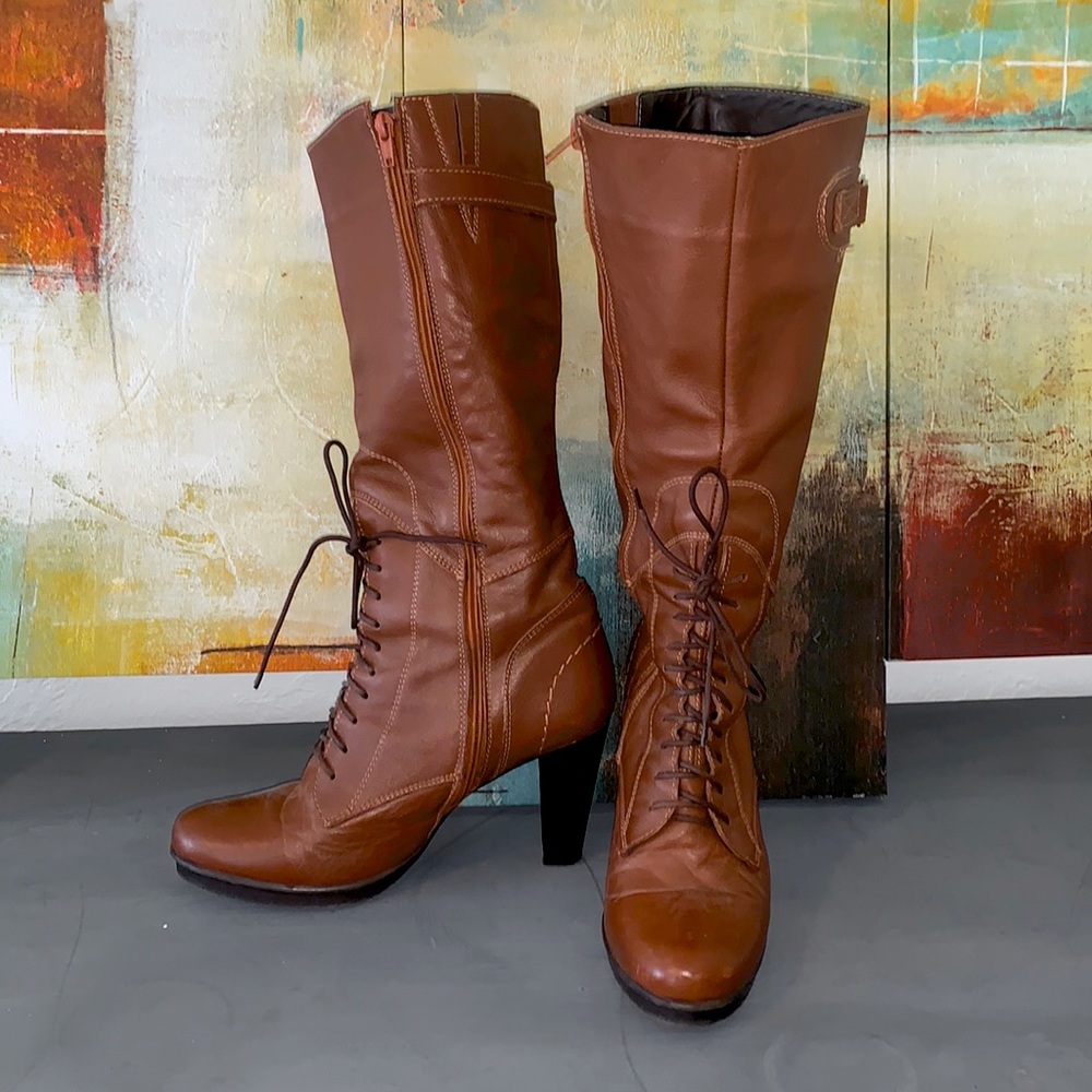 high-heeled boots in perfect condition! Size 9.5 or can fit 10 as well!
